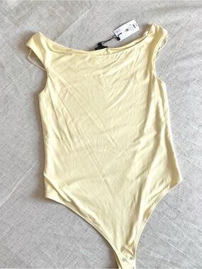 Dynamite Soft Buttercup Yellow Bodysuit